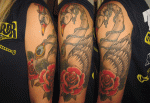 mark-lonsdale-tattoo-bondi-sydney-healed-swan-jewelry-mirror-feather-roses1